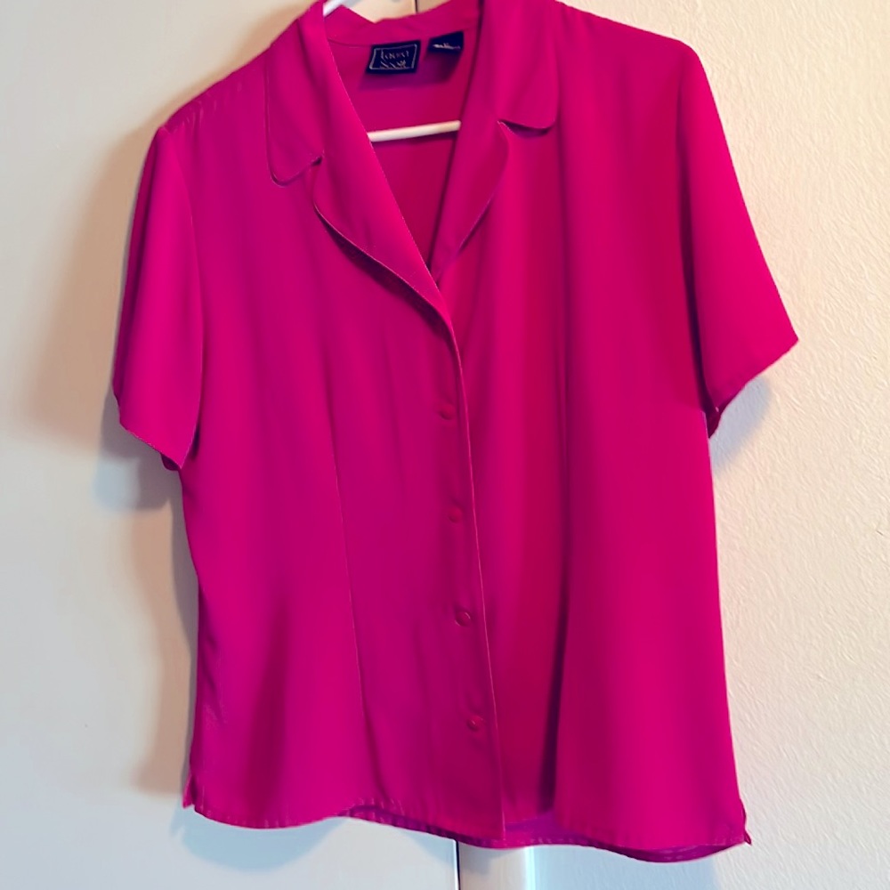 Laura Scott pretty in pink blouse.